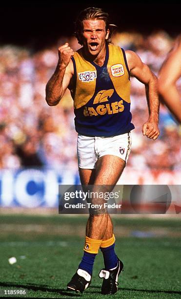 Chris Mainwaring of West Coast celebrates a goal in the AFL Grand Final match between the West Coast Eagles and the Geelong Cats, played at the...