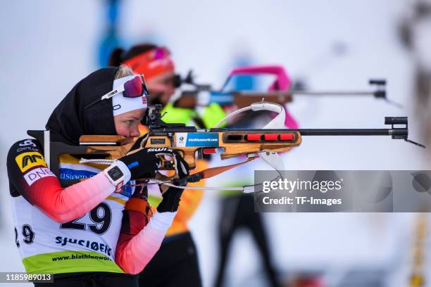 Hilde Fenne of Norway at the shooting range during the Women 10 km Pursuit of the IBU Cup Biathlon Sjusjoen on December 1, 2019 in Sjusjoen, Norway.