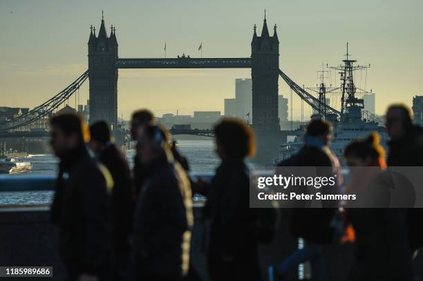 Commuters cross London Bridge, after it was reopened following the terror attack, on December 2, 2019 in London, England. Usman Khan, a 28 year old...