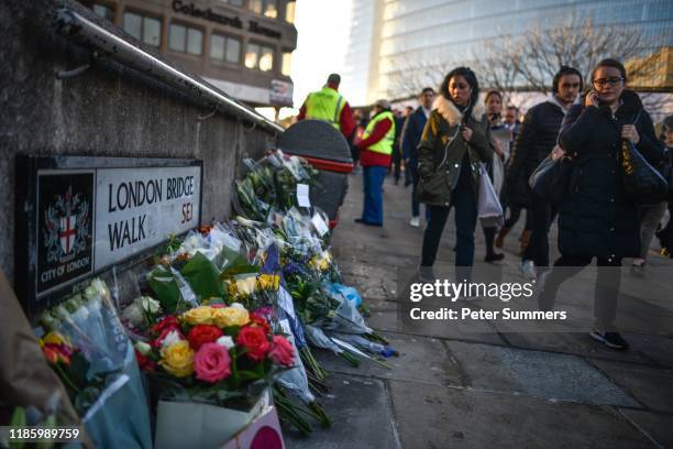 Floral tributes are left for Jack Merritt and Saskia Jones, who were killed in a terror attack, on December 2, 2019 in London, England. Usman Khan, a...