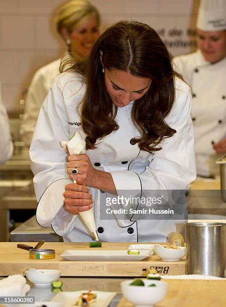Catherine, Duchess of Cambridge attends a cooking workshop and reception at the Institut De Tourisme et d'hotellerie du Quebec on day 3 of the Royal...