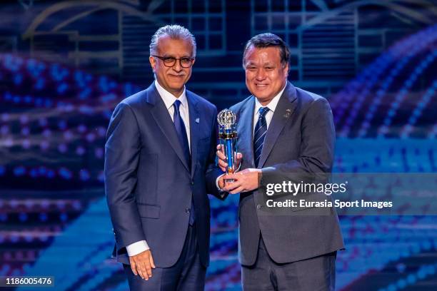 Kohzo Tashima, president of the Japan Football Association, poses for photo after receiving the AFC Member Association of the Year award during the...