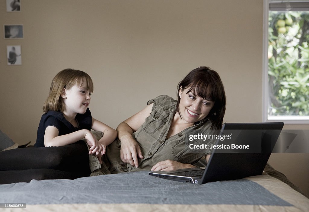 Mother and daughter on computer