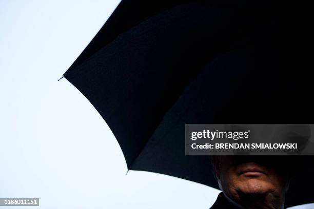 President Donald Trump speaks to the press before departing from the White House on December 2, 2019 in Washington,DC en route to London, to meet...