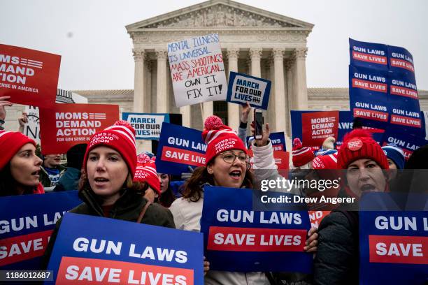 Gun safety advocates rally in front of the U.S. Supreme Court before during oral arguments in the Second Amendment case NY State Rifle & Pistol v....