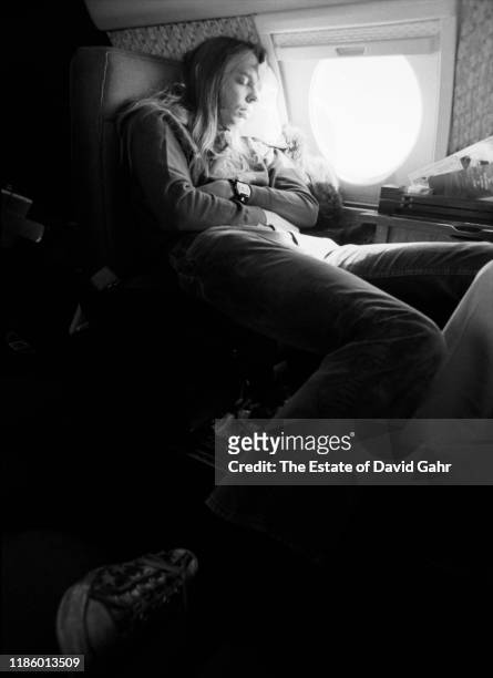 Keyboardist Rick Wakeman, a member of the English progressive rock group Yes, relaxes on a airplane flight to Athens, Georgia in November, 1972.