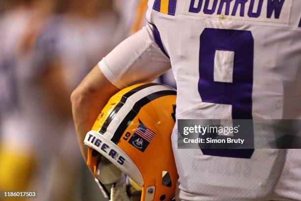 Closeup rear view of LSU QB Joe Burrow holding helmet during game vs Arkansas at Tiger Stadium. Equipment. Baton Rouge, LA CREDIT: Simon Bruty