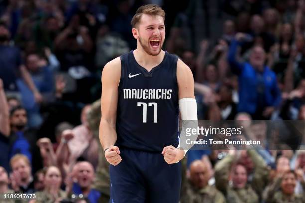 Luka Doncic of the Dallas Mavericks celebrates after the Dallas Mavericks scored against the Orlando Magic in the second half at American Airlines...