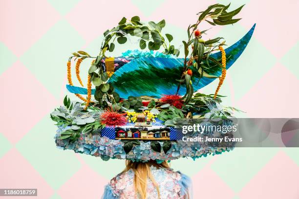 Woman wearing an Australian themed hat poses for a portrait during 2019 Oaks Day at Flemington Racecourse on November 07, 2019 in Melbourne,...