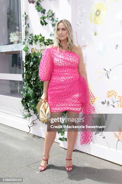 Jess King attends Oaks Day at Flemington Racecourse on November 07, 2019 in Melbourne, Australia.