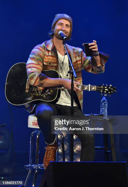 Ryan Hurd performs on stage during “Stars and Strings Presented by RAM Trucks Built to Serve,” a RADIO.COM Event, at the Fox Theatre on November 06,...