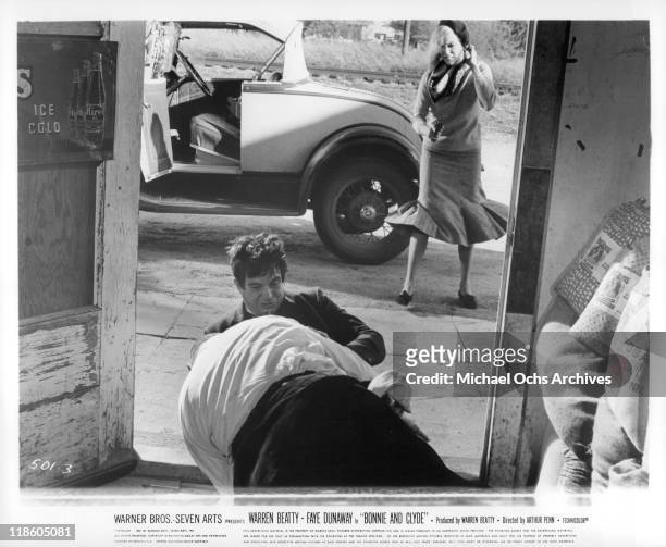 Warren Beatty struggles with James Stiver in a scene from the film 'Bonnie and Clyde', 1967.