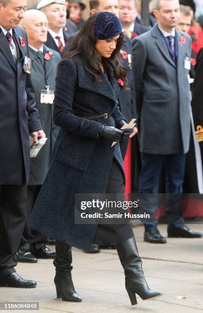 Meghan, Duchess of Sussex lays a cross carrying a personal message in memory of those who lost their lives in the service of others as she attends...