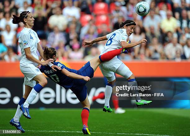 Gaetane Thiney of France challenges Jill Scott and Fara Williams of England during the FIFA Women's World Cup 2011 Quarter Final match between...