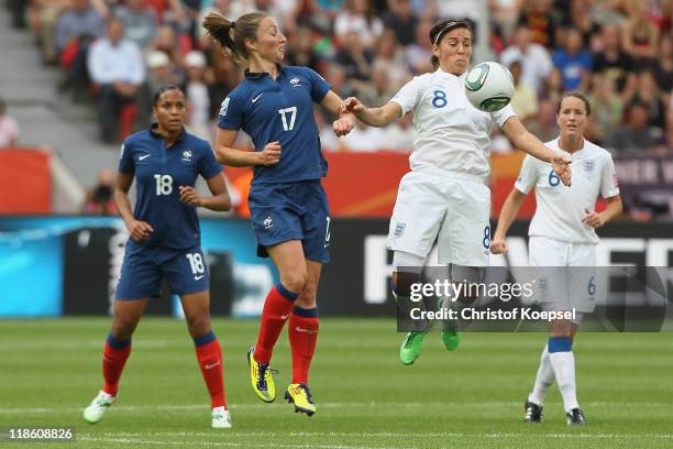 Gaetane Thiney of France and Fara Williams of England go up for a header during the FIFA Women's World Cup 2011 Quarter Final match between England...