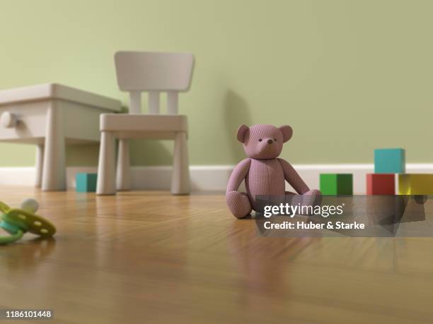 nursery with teddy bear and toys - ludoteca foto e immagini stock