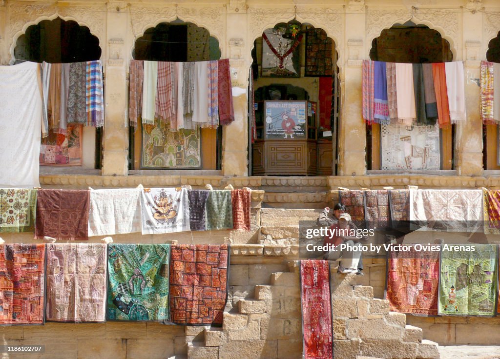 Outdoors display of typical rajasthani fabrics for selling in Jaisalmer, Rajasthan, India