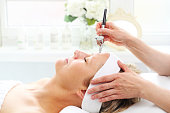 Bioinfusion and oxybrasion. Cosmetic treatment. Facial skin care.
