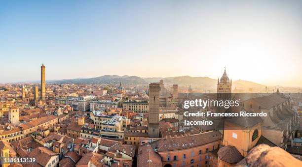 bologna, unique high res panoramic view of the from above, with all towers and churches at sunset - baloney stock pictures, royalty-free photos & images