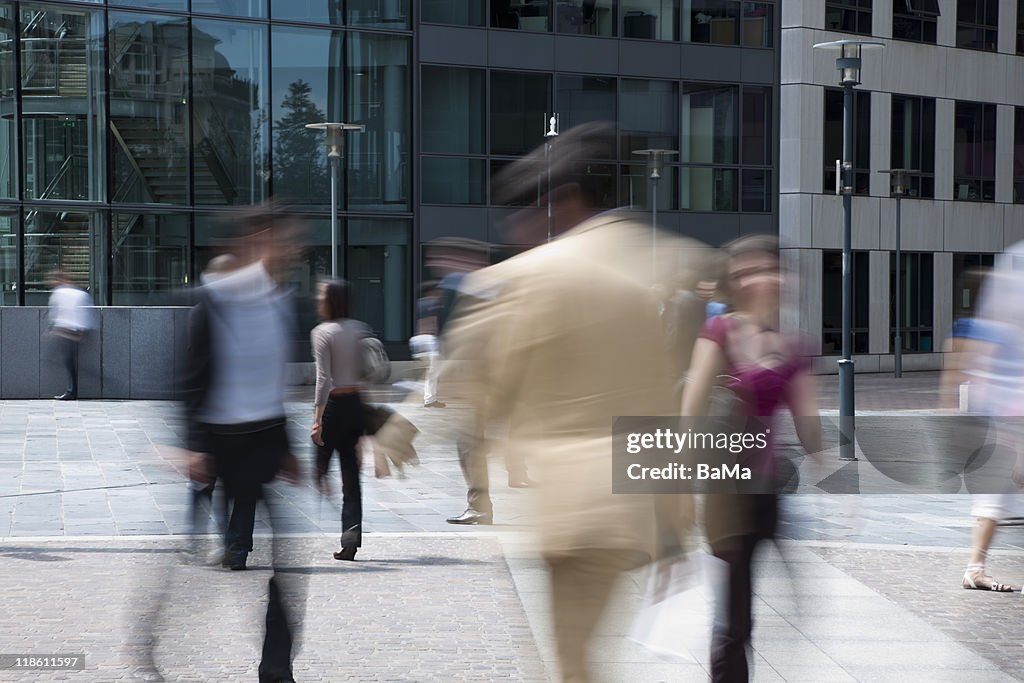 People Rushing Into Building Business People Rushing Past Office Building High-Res Stock Photo ...