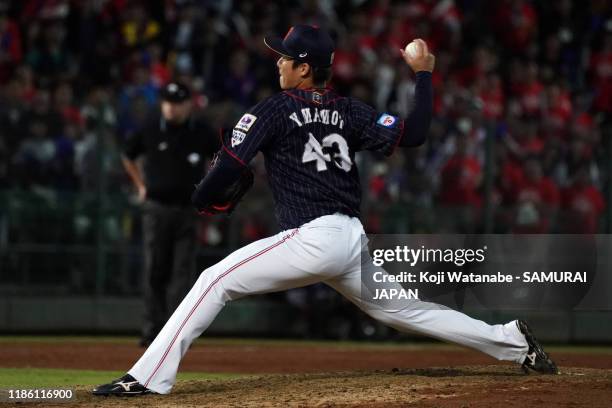 Pitcher Yoshinobu Yamamoto of Japan throws in the bottom of 9th inning during the WBSC Premier 12 Opening Round Group B game between Chinese Taipei...