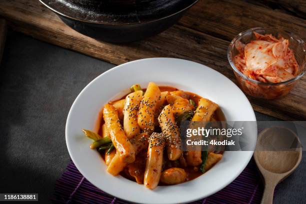 hot and spicy tteokbokki / korean food - korean language stock pictures, royalty-free photos & images