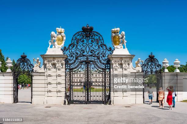 ornate wrought iron gate of belvedere palace in vienna austria - belvedere palace vienna imagens e fotografias de stock