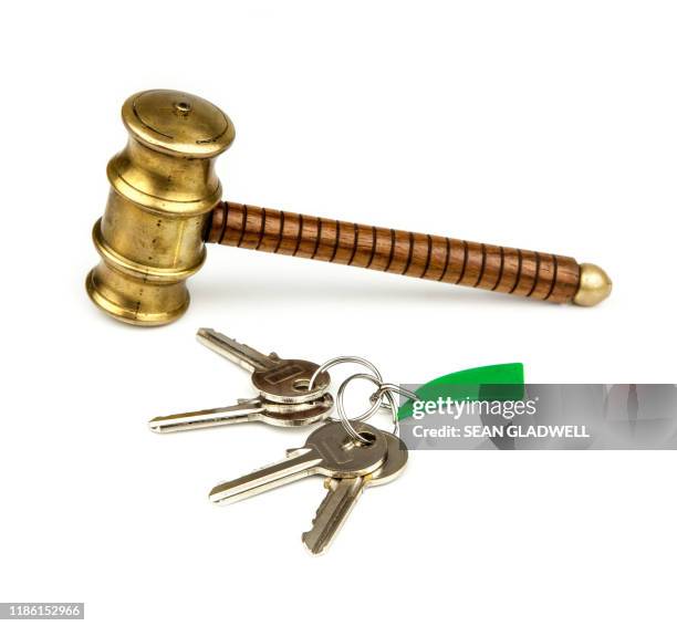 house keys and auction hammer - auction property stock pictures, royalty-free photos & images