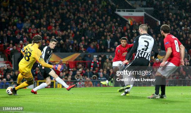 Mason Greenwood of Manchester United scores his team's first goal during the UEFA Europa League group L match between Manchester United and Partizan...
