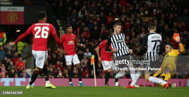 Mason Greenwood of Manchester United scores their first goal during the UEFA Europa League group L match between Manchester United and Partizan at...