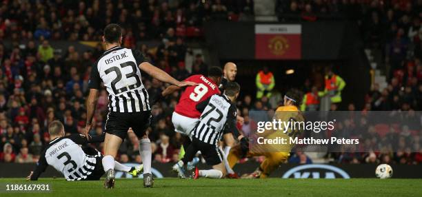 Anthony Martial of Manchester United scores their second goal during the UEFA Europa League group L match between Manchester United and Partizan at...