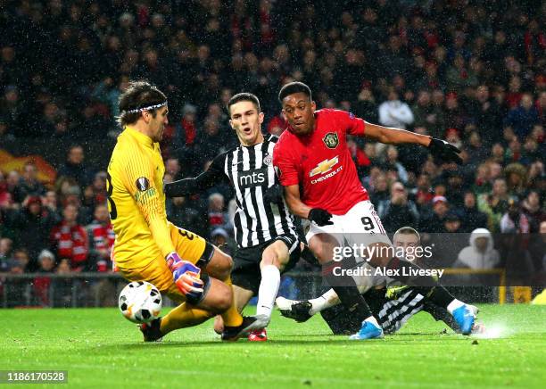 Anthony Martial of Manchester United scores his team's second goal during the UEFA Europa League group L match between Manchester United and Partizan...