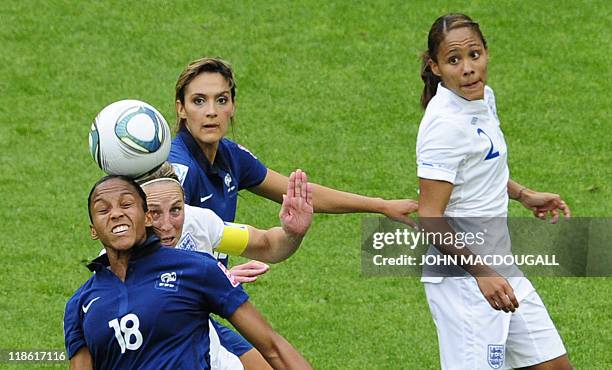 France's striker Marie-Laure Delie and France's midfielder Louisa Necib vie for the ball with England's defender Faye White and England's defender...