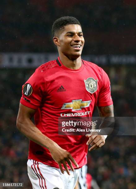 Marcus Rashford of Manchester United celebrates after scoring his team's third goal during the UEFA Europa League group L match between Manchester...
