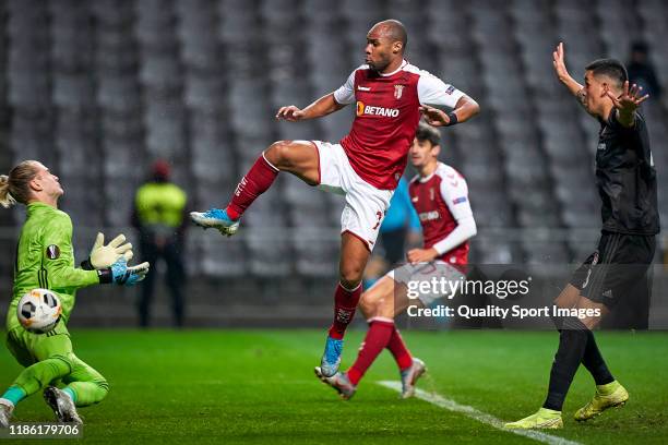 Wilson Eduardo of SC Braga shoots on goal and scores his team's third goal during the UEFA Europa League group K match between Sporting Braga and...