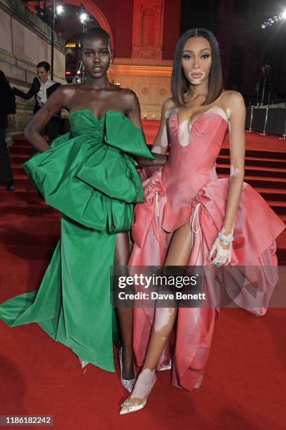 Adut Akech and Winnie Harlow arrive at The Fashion Awards 2019 held at Royal Albert Hall on December 2, 2019 in London, England.