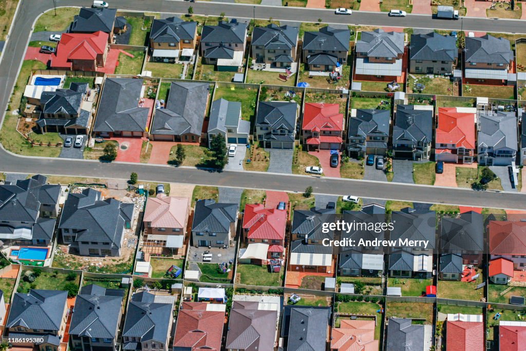 Houses, streets, suburb on edge of city, urban sprawl in Sydney, Australia, aerial photography