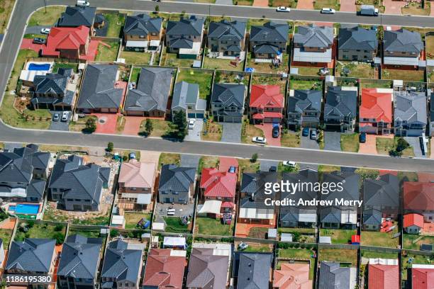 houses, streets, suburb on edge of city, urban sprawl in sydney, australia, aerial photography - suburbia australia stock pictures, royalty-free photos & images