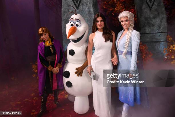 Idina Menzel and Frozen characters attend the premiere of Disney's "Frozen 2" at Dolby Theatre on November 07, 2019 in Hollywood, California.