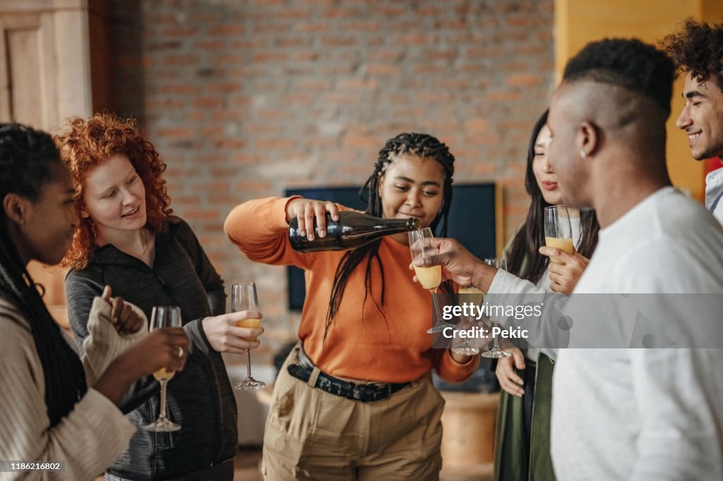Celebrating their roommate's birthday