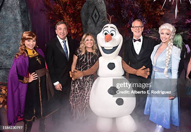 Anna, Producer Peter Del Vecho, Director/writer/Walt Disney Animation Studios CCO Jennifer Lee, Olaf, Director Chris Buck, and Elsa attend the world...