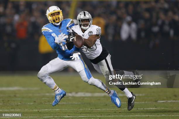 Lamarcus Joyner of the Oakland Raiders breaks up a pass intended for Keenan Allen of the Los Angeles Chargers at RingCentral Coliseum on November 07,...