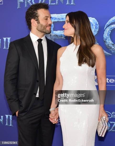 Aaron Lohr and Idina Menzel attend the Premiere of Disney's "Frozen 2" at Dolby Theatre on November 07, 2019 in Hollywood, California.