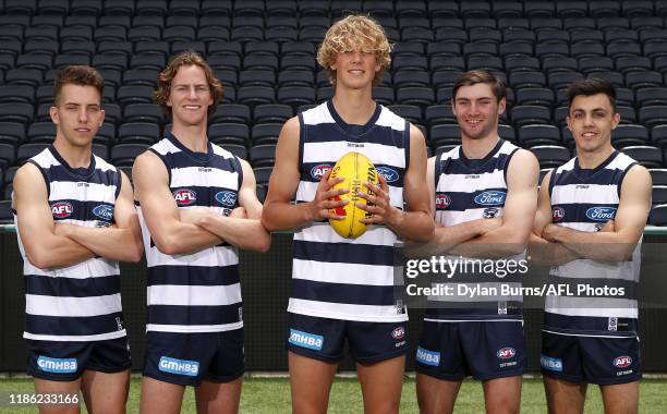 New recruits Francis Evans, Cooper Stephens, Sam De Koning, Cam Taheny & Brad Close of the Cats pose for a photo during a Geelong Cats media...