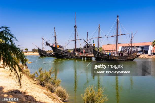 replicas of christopher columbus's boats: the niña, the pinta, and the santa maría in palos de la frontera, spain - santa maria stock pictures, royalty-free photos & images