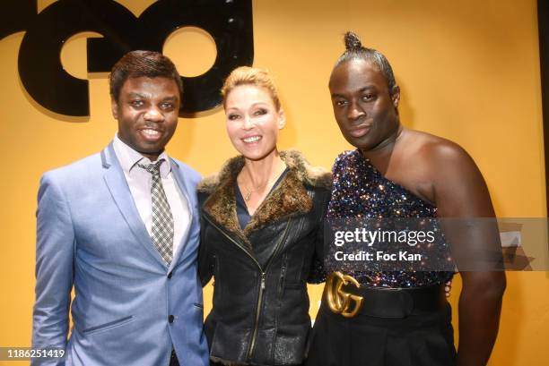 Jean Barthelemy Bokassa, singer Indra and PR Antoine Schmidt attend the Red X BHV Marais Ephemere Boutique Launch Party on November 07, 2019 in...