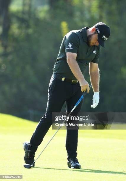 Tyrrell Hatton of England reacts after hitting his second shot on the first during Day Two of the Turkish Airlines Open at The Montgomerie Maxx Royal...