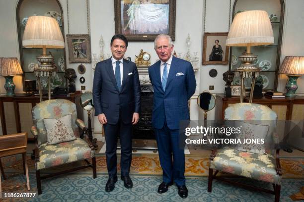 Britain's Prince Charles, Prince of Wales and Italy's Prime Minister Giuseppe Conte pose for a photograph during their meeting at Clarence House in...