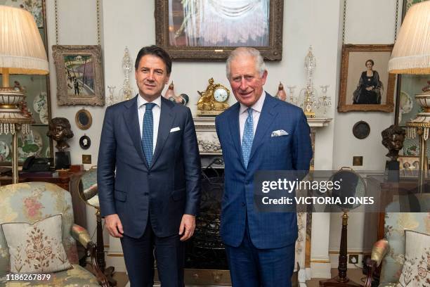 Britain's Prince Charles, Prince of Wales and Italy's Prime Minister Giuseppe Conte pose for a photograph during their meeting at Clarence House in...