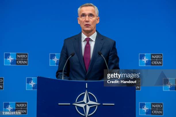 In this handout provided by NATO, Jens Stoltenberg, Secretary General of NATO speaks at a press conference ahead of the NATO Leaders meeting at the...